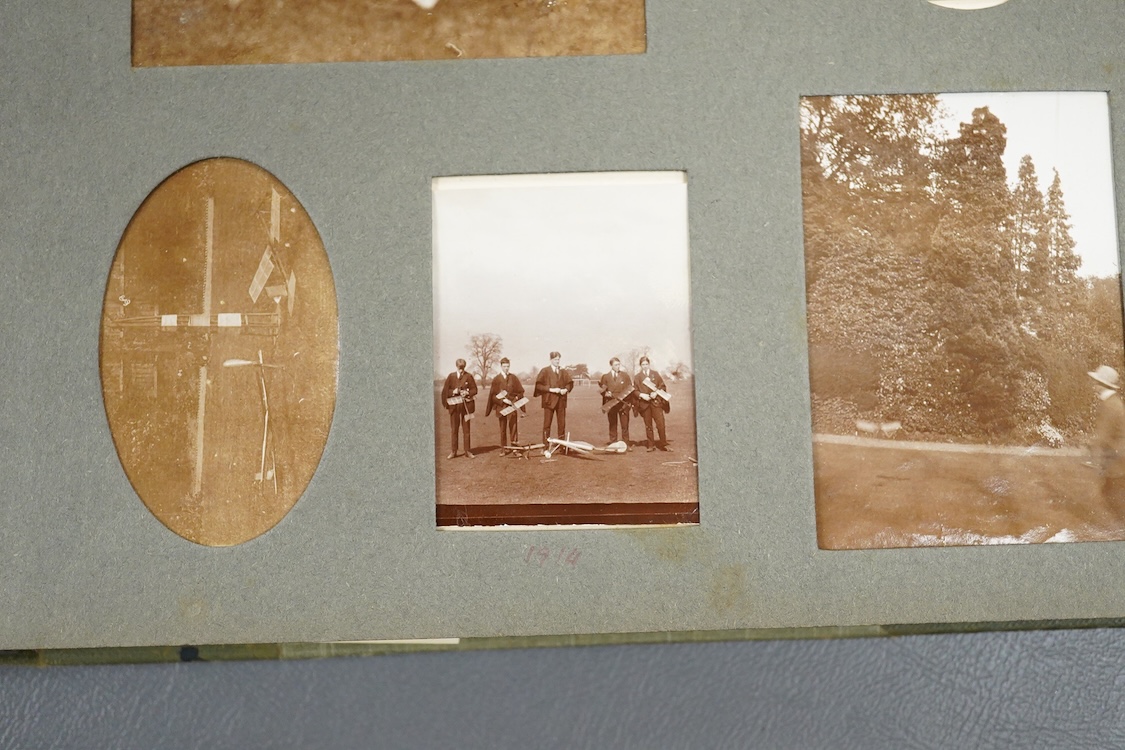 Aviation interest; an early 20th century photograph album containing a number of views of early aircraft and cars, including; the aviator Reginald Marix flying a Sopwith Camel to Radley College in 1914, early cars at Hen
